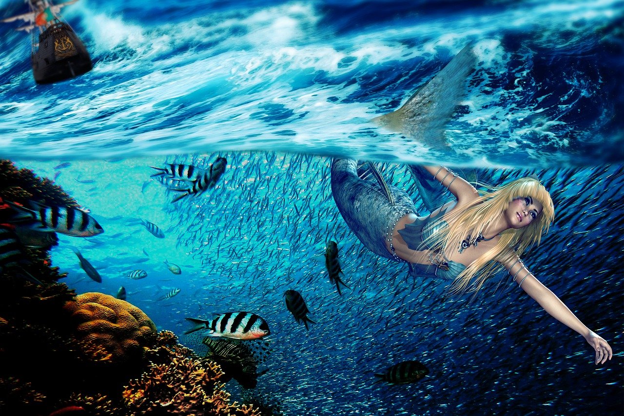 siren swimming in deep blue ocean